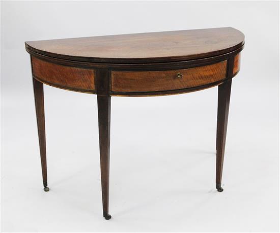 A George III mahogany folding demi lune tea table, W.3ft 6in.